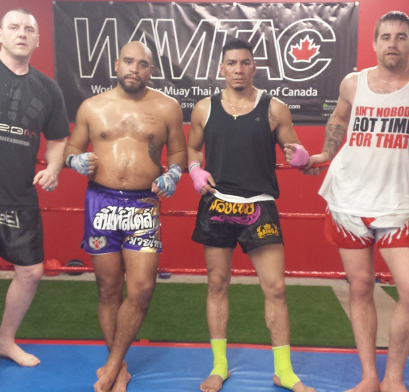 Glory Muay Thai fighters together in the ring after sparring